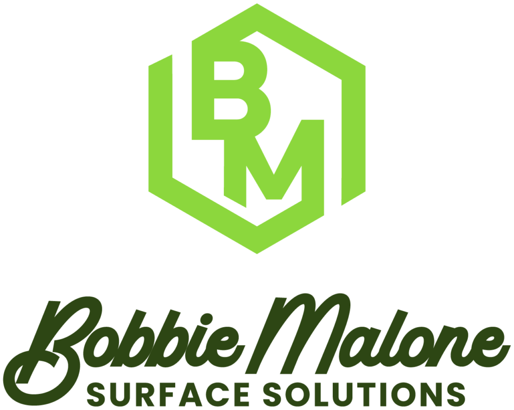 Green hexagon logo with "BM" inside and "Bobbie Malone Surface Solutions" text below, showcasing a modern and clean design theme.