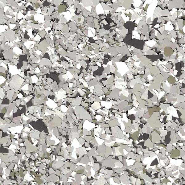 Abstract image featuring a dense, irregular pattern of gray and white shapes, resembling fragmented pieces scattered across the surface. No distinct landmarks visible.